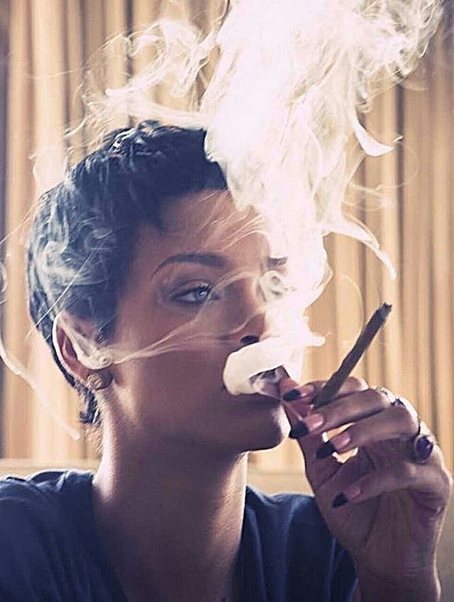 Black haired woman having smoking
