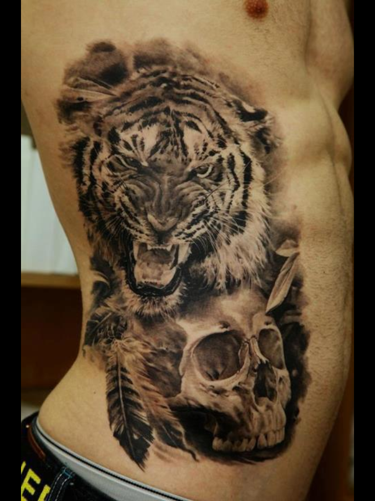 Tiger rib tattoo for Noah  Chris ODonnell Tattoo