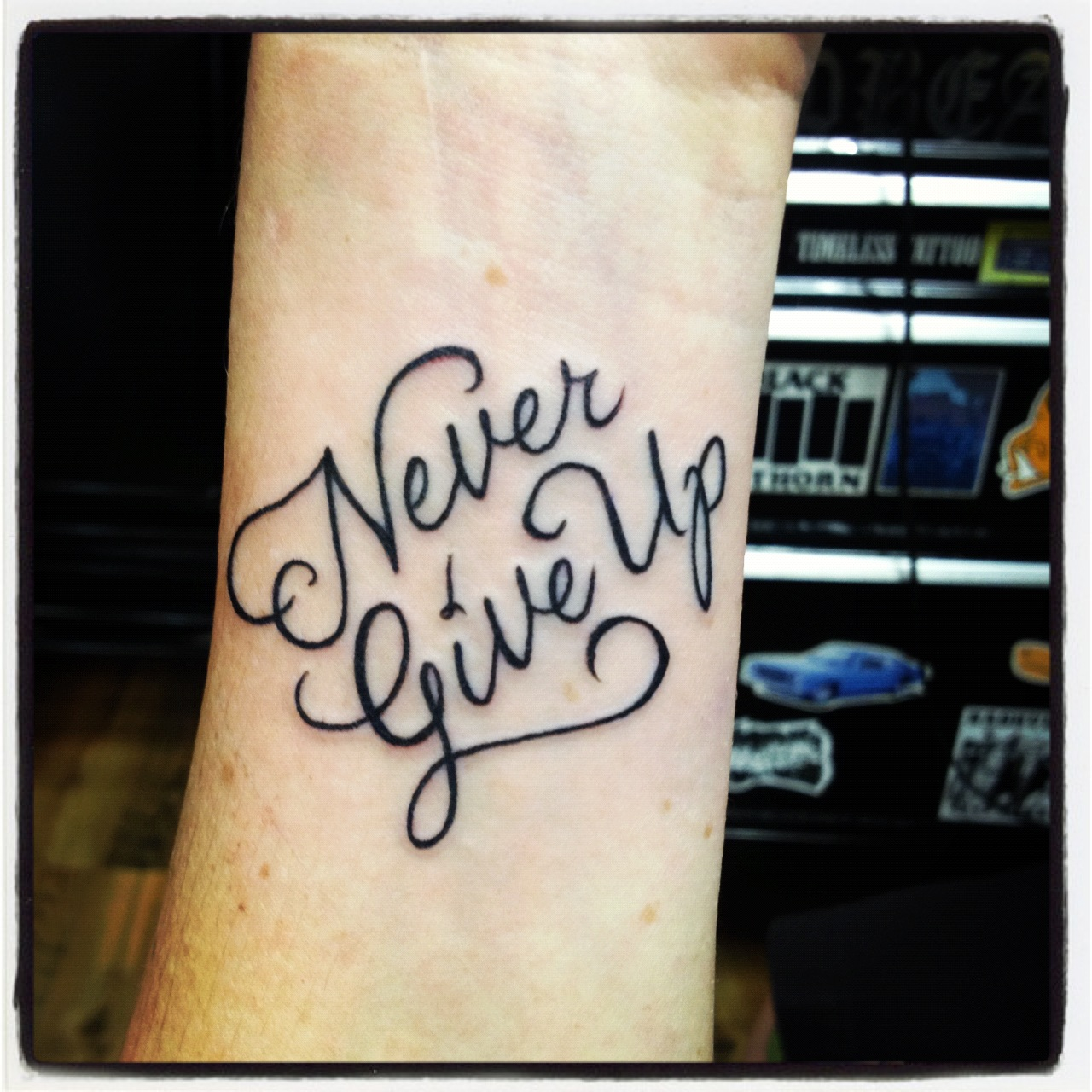 60 Never Give Up Tattoos For Men  Phrase Design Ideas