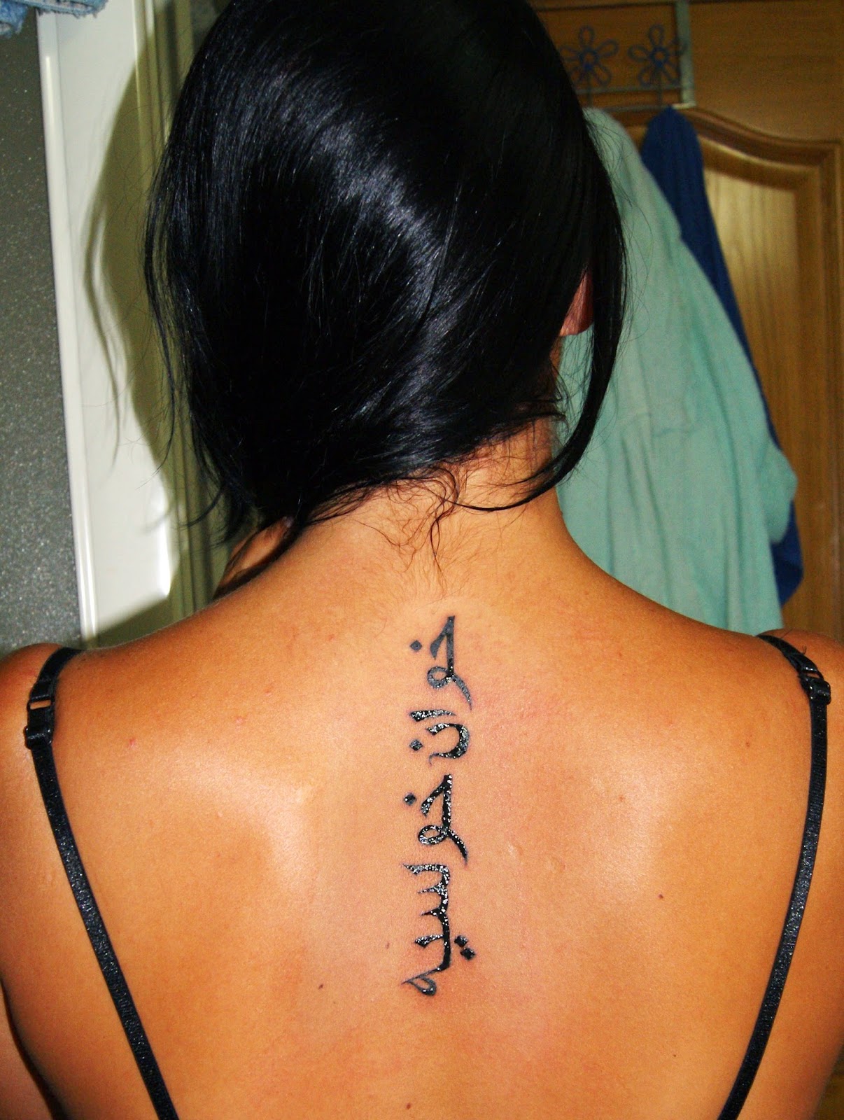 Spine Tattoo Arabic  Spine tattoos for women Tattoo fonts Stylish tattoo
