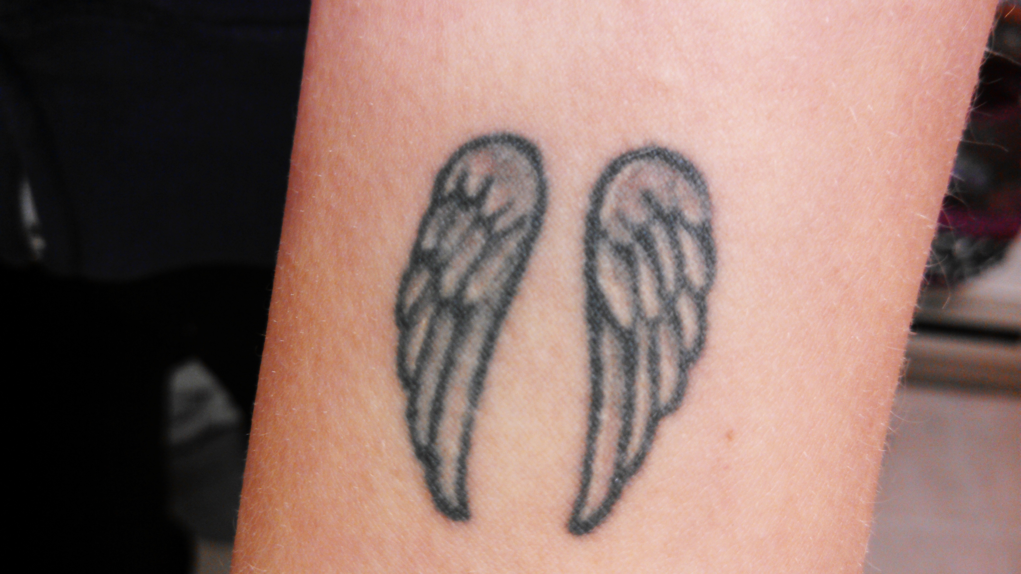 20 Iconic Angel Wing Tattoo Designs with Meanings and Ideas  Body Art Guru