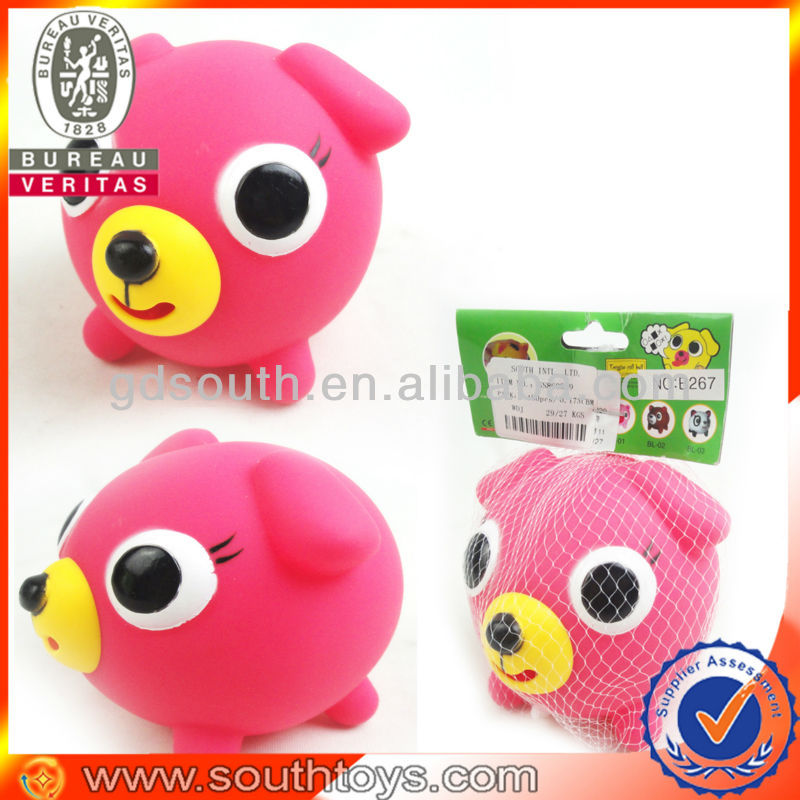 pink dog toy that sticks tongue out