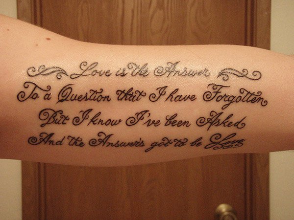 Quote Tattoo On Man Inner Bicep