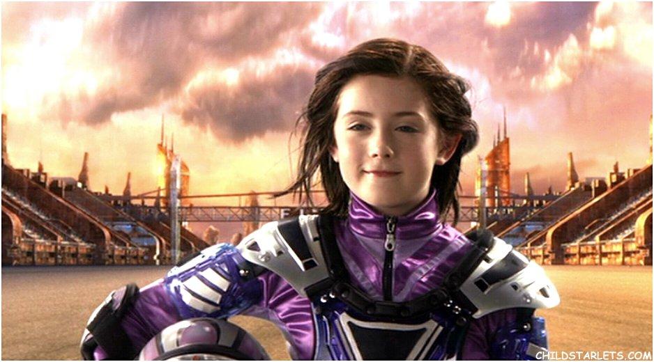 character the girl in the purple suut name from the movie spy kids 3 game over