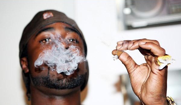 Young Buck smoking a cigarette (or weed)
