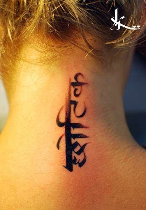 Tibetan letters for tattoo vertical cursive columns handmade  Tibetan  tattoo Tattoos Tibetan script