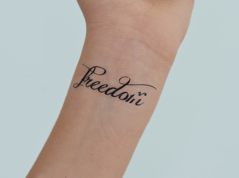 Freedom isn't just a word, it's a feeling. And for Azadi, it's a name and a  tattoo. 🔥 . This beautiful calligraphy tattoo by @calligramod… | Instagram