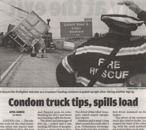 Condom truck tips – oops – spills its load all over the road.