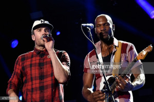 Singer Sam Hunt L performs onstage during the 2015 CMA Festival on