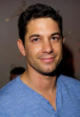 Adam Garcia With His Baby Onch