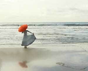 Girl, Ocean, Beach and Red Umbrella
