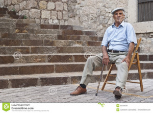 POLIZZI GENEROSA, SICILY-AUGUST 19: old Sicilian man, sitting waiting ...
