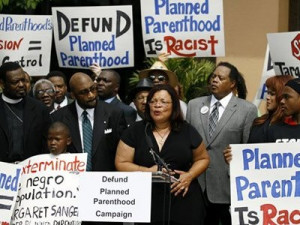 Alveda King and others demonstrating against Planned Parenthood