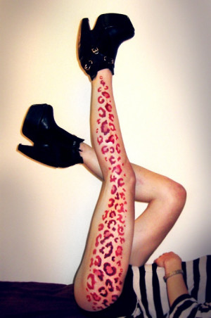 cheetah print tattoo on leg Cheetah Print Tattoos