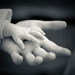 jesus_holding_hands_with_child.jpg