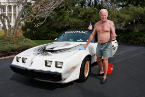 Biden washing his classic 1981 Pontiac