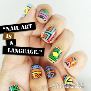 Nail art used in photo is Tribal .