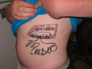 coolest tribute to retro music with a cassette tape tattoo