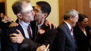 ... kiss from his partner Stuart Gaffney at City Hall in San Francisco