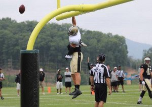 Jimmy Graham Dunks over Goalpost at Training Camp, Gets Flagged