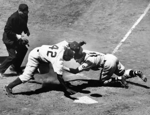 Jackie Robinson tagged out at plate by the Pirates' Clyde McCullough ...