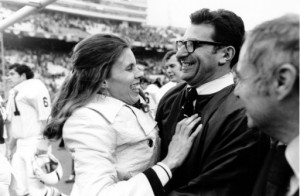 photo, Penn State football coach Joe Paterno is embraced by his wife ...