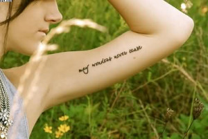 Cute Lettering Tattoo On Inner Arm Of Girl