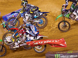 ryan morais 65 lands on trey canard s 41 head and back both racers are ...