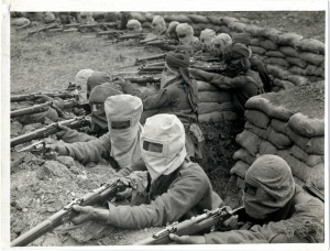Indian infantrymen training for receiving a gas attack, 1915.