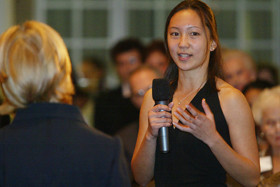 Duke student Grace Shih speaks to Judy Woodruff at the launch of the