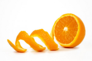 Peeling an orange for Vin d' Orange cordial