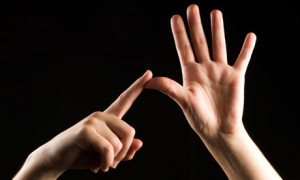 The letter 'A' fingerspelled in British sign language. Younger BSL ...