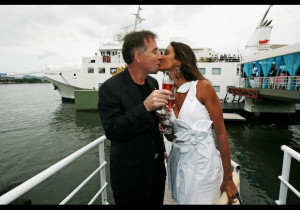 Eike Batista on a yacht in Marina da Gloria kisses his girlfriend