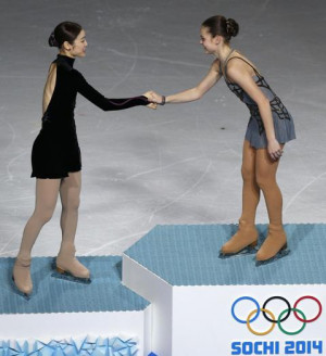 Yuna Kim (left) and Adelina Sotnikova greet each other after the 2014 ...