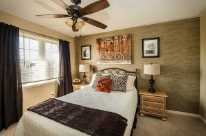 Surround a wrought iron headboard with soft and friendly textures to ...