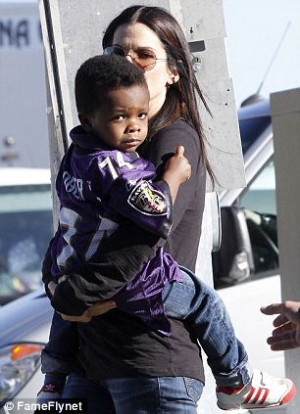 Proud mama: Sandra Bullock dressed her son, Louis, in a Michael Oher ...