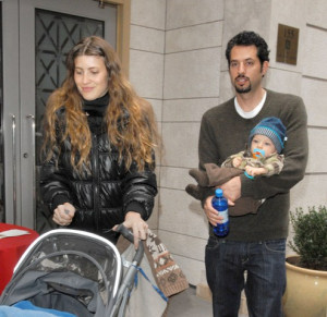 with Guy Oseary and their son.