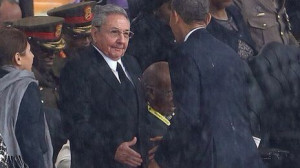 Raul Castro's unprecedented handshake with Barack Obama took place at ...