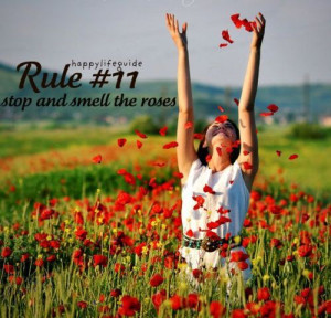 happiness quote: stop and smell the roses.