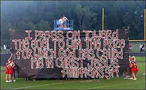 Fort Oglethorpe cheerleaders with banner