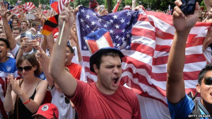 Fans cheer on the US football team during its World Cup match against ...