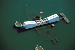 ... USS Arizona Memorial stands above the sunken vessel and her fallen