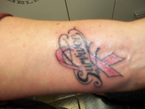 Breast Cancer Survivor Tattoos She is a survivor of breast