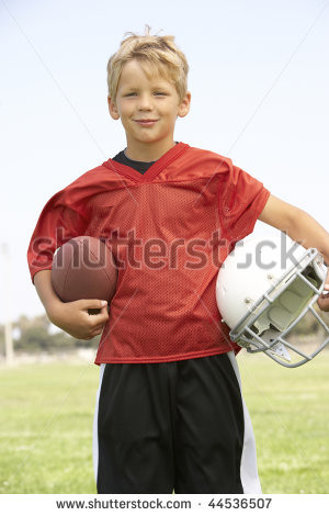 stock photo : Young Boy Playing American Football