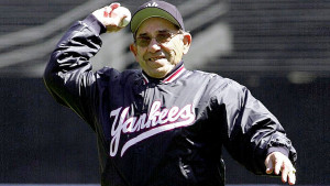 Former New York Yankees catcher Yogi Berra throws out the first pitch
