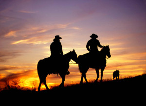 Cowboy Riding Into Sunset Cowboys riding into the