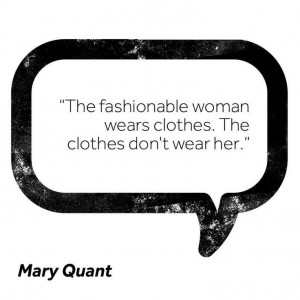 ... wears clothes. The clothes don't wear her.