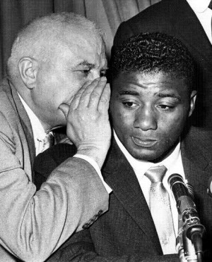 Cus D'Amato whispering to Floyd Patterson