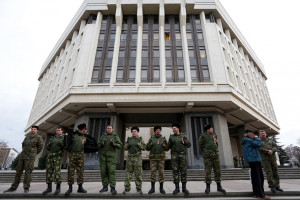 Buidling of government office in Simferopol surrounded by armed men ...