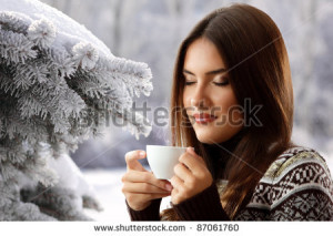 teen girl attractive drinking coffee over winter nature background ...